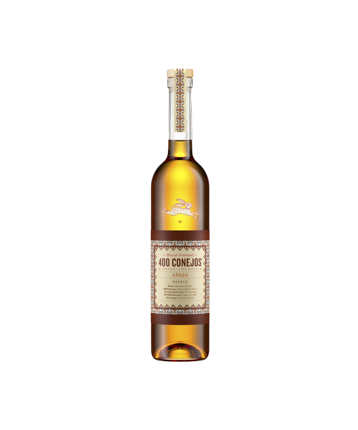 Bottle of 400 Conejos tequila on a beige background